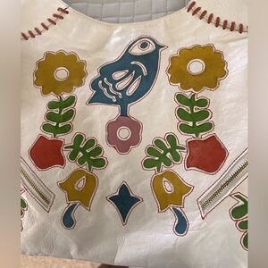 Winter white leather purse with suede cutouts